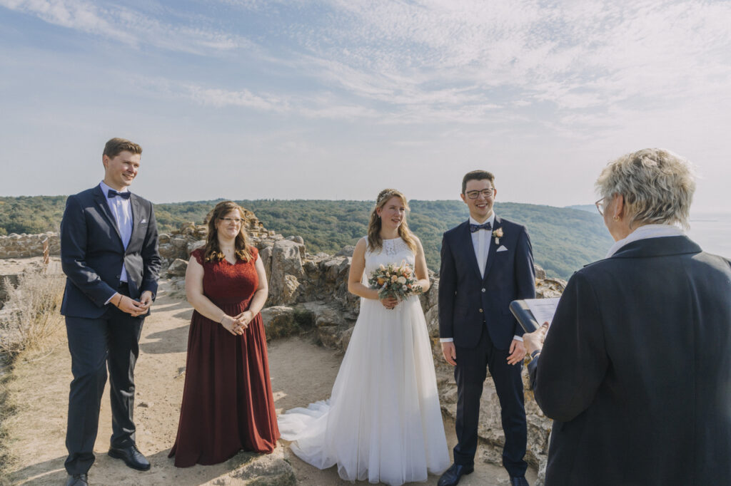 A romantic elopement destination at Hammershus Ruins is what Marcus & Franziska chose for their outdoor wedding ceremony abroad.