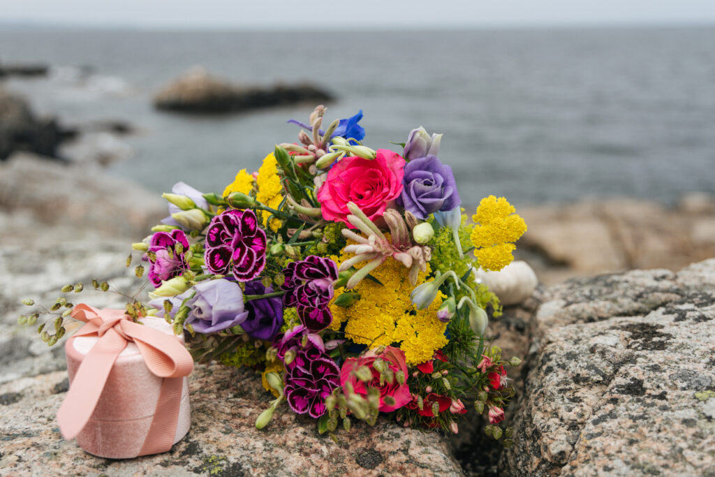 A bride bouquet on the stone.