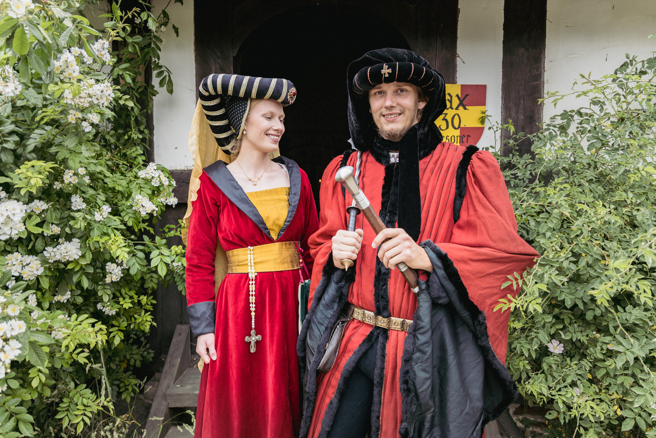 A couple during their historical medieval adventure wedding in Bornholm