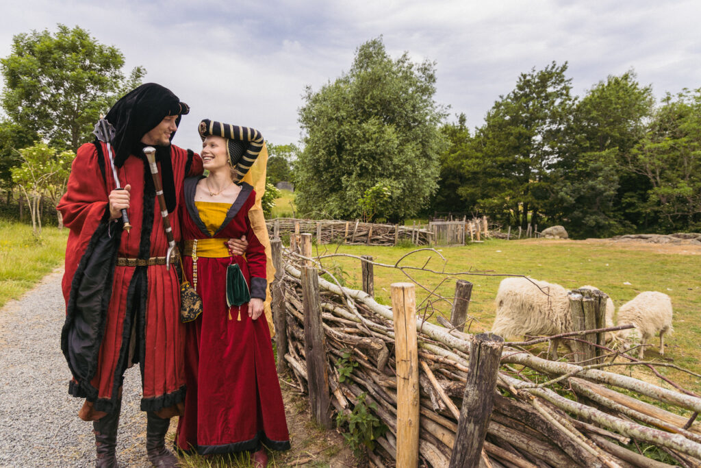 Newlyweds enjoying their medieval wedding, an elopement abroad idea, for bold couples, at Bornholm Island in Denmark.