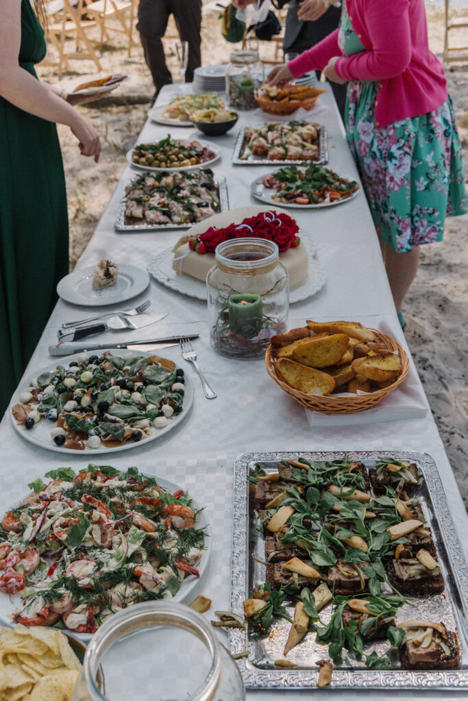 A photo of the table with food during the reception at micro wedding abroad in Bornholm