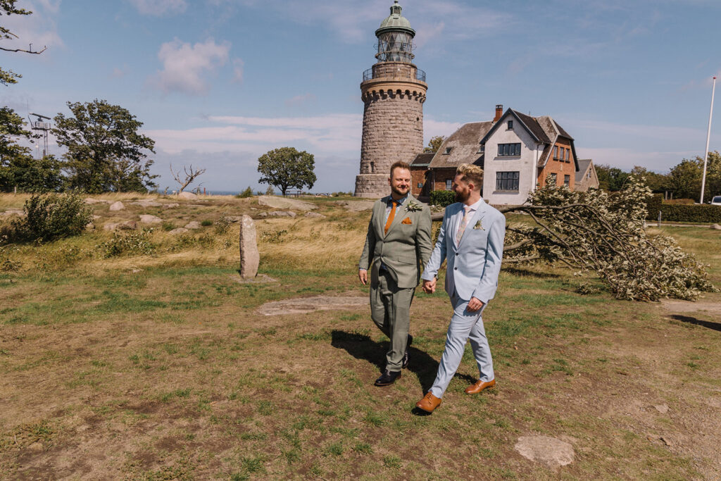 A guy couple enjoying their same-sex wedding abroad in Scandinavia