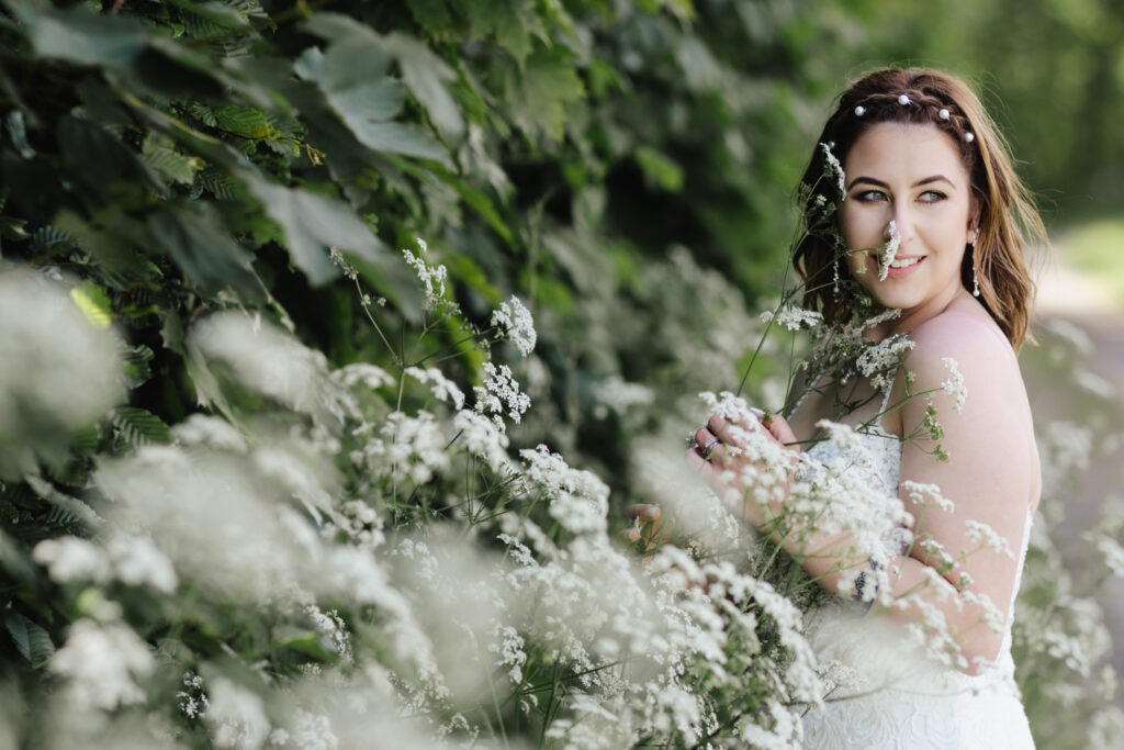 A photo of the bride in the park of Bornholm island.
